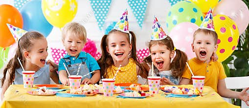 Children`s birthday. happy kids with cake