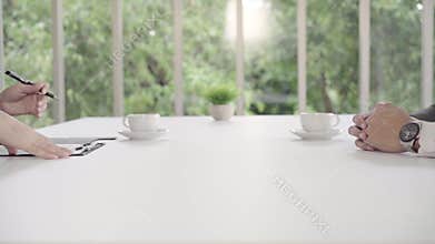 Slow motion - Handshake to seal a deal after a job recruitment meeting.