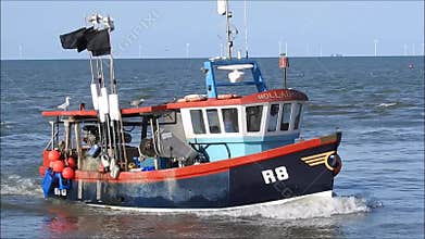 Fishing boat tug coming into harbour