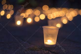 A group of candles burning in street. Day of Remembrance for the Bereaved