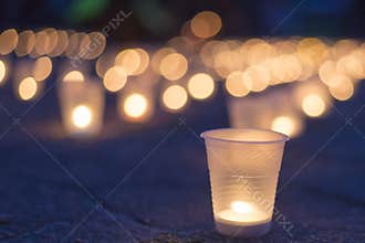 A group of candles burning in street. Day of Remembrance for the Bereaved