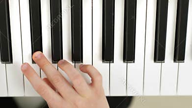 Brothers Playing in Tandem a Piano Partiture
