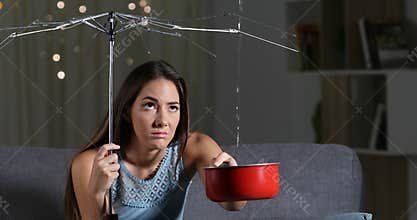 Woman suffering home water leaks due bad insurance