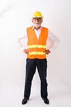 Full body shot of handsome senior bearded man construction worke