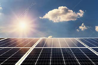 concept clean power energy. solar panel and sunlight with blue s