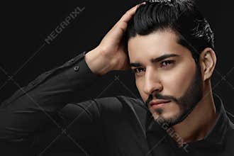 Men Hair Beauty. Handsome Male Model Touching Healthy Hair