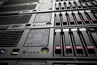 Servers stack with hard drives in a data center