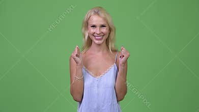 Young happy beautiful businesswoman looking excited