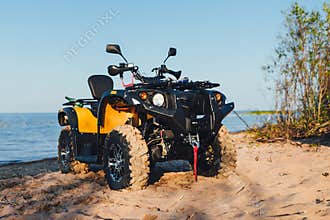 Quad bike ATV, lake background