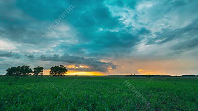 Rain Rainy Clouds Above Countryside Rural Field Landscape With Young Green Wheat Sprouts In Summer Cloudy Sunset Evening