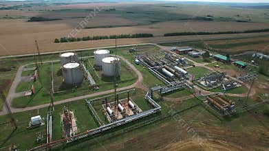 Aerial orbit panorama of fuel and crude oil storage facilities. The oil and gas industry.