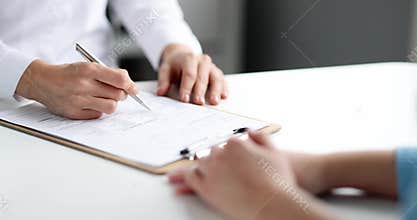 Doctor fills out patient medical record slow motion 4k movie