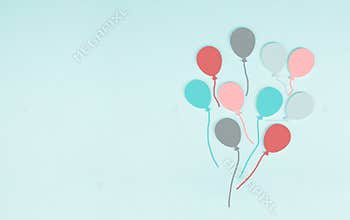 Colorful ballons on a blue colored background, children birthday greeting card, happy holiday, copy space