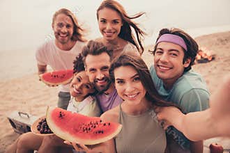 Photo of young cheerful friends happy positive smile make selfie eat fruit picnic lake weekend rest outdoors