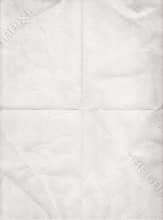 Old white paper folded in four