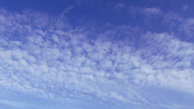 Cirrus clouds in the blue sky in early spring.
