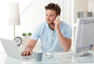 Casual businessman working in office