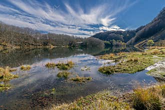 Beautiful panoramic view of Lake Santo Modenese on a sunny day, Pievepelago, Italy