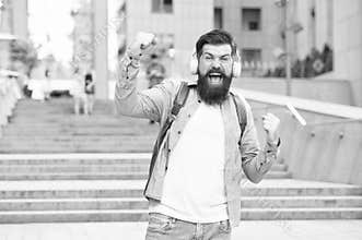 Energy concept. Joy and positivity. Route to work. Alone with music. Free and happy. Modern life. Man with headphones