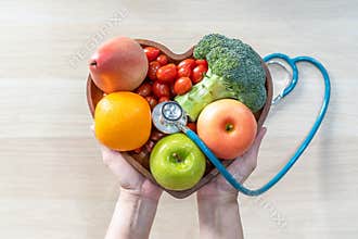Nutritional food for heart health wellness by cholesterol diet and healthy nutrition eating with clean fruits and vegetables