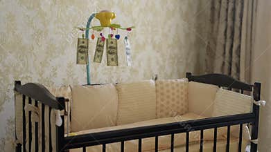 Musical toy carousel above the baby bed