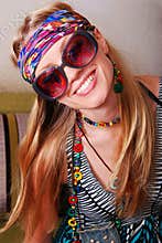 Smiling hippie in sunglasses