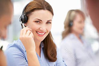 Call centre operator helping customer