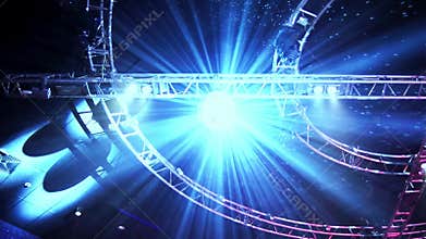 Disco ball is spinning round on the ceiling in night club in slow motion filmed from below