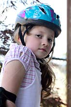 Little girl wearing helmet