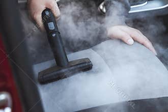 Cleaning and disinfecting by steam of the car interior and car s