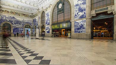 Painted ceramic tileworks on the walls of Main hall of Sao Bento Railway Station in Porto timelapse.