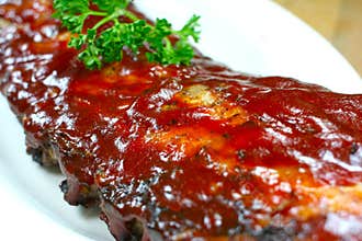 Delicious pork ribs smothered