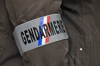 Gendarmerie armband worn on a jacket