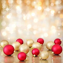 Christmas baubles on defocused lights background