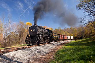 WM Steam train powers along railway