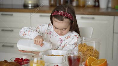 Kid preparing breakfast bowl in kitchen