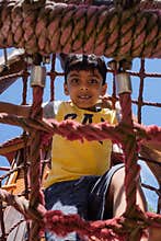 A happy child playing outdoor in the park; casual portrait