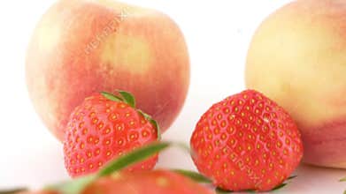 extremely close-up, detailed. ripe peaches and strawberries on white background