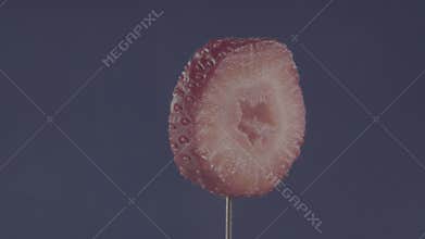 Strawberry rotating with loop on blue screen for chroma key