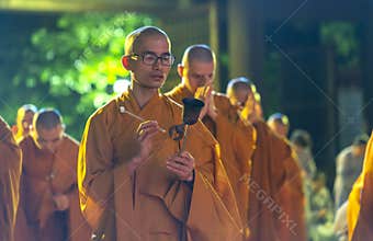 Monks are chanting prayers for peace during annual Amitabha Buddha ceremony