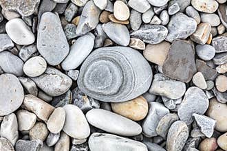 Beach stones in different sizes.
