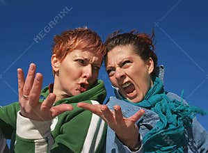 Angry girls having quarrel