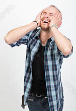 Shocked man shouting in despair