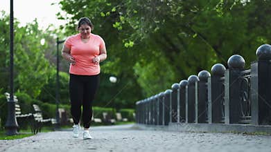 park jogging weight loss overweight woman running