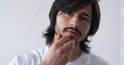 appearance examination pensive man facial grooming