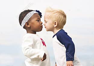Diverse Little Kids First Kiss