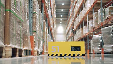 Close up of an automated machine moving along the storage floor