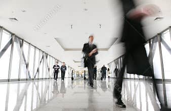 Moving crowd in corridor