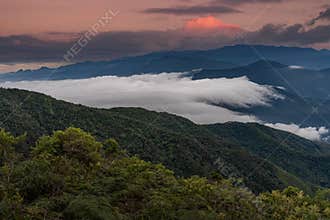 The majestic black lagoon in the snowy park where the Nevado del Ruiz