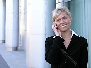Businesswoman using a mobile phone